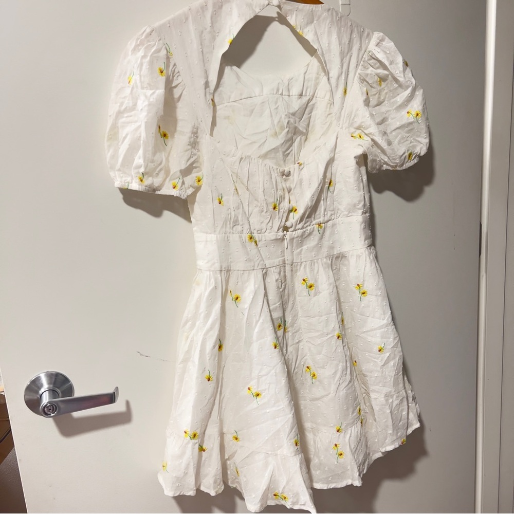 Chic White Dress with Yellow Floral Accents